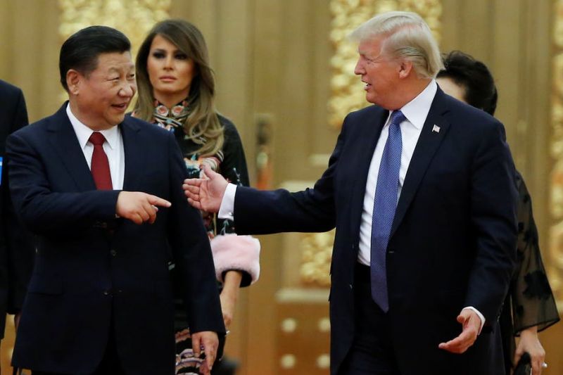 US President Donald Trump and his Chinese counterpart Xi Jinping. Reuters/Thomas Peter